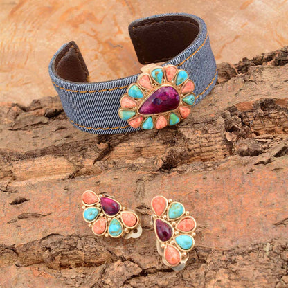 Denim bracelet with colorful stone design on a wooden surface