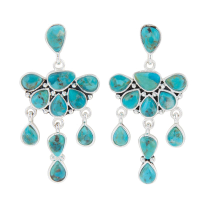 Turquoise teardrop earrings on a white background