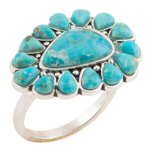 Turquoise ring with silver setting on a white background