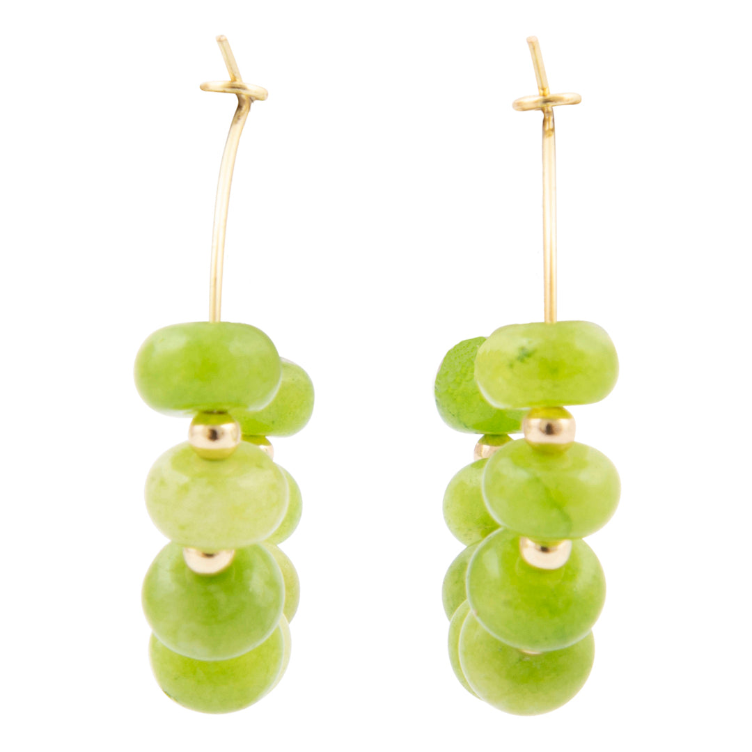 Green grape-shaped earrings with gold accents on a white background