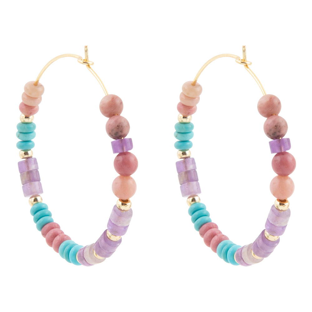 A pair of gold-tone hoop earrings decorated with pastel-colored beads in pink, purple, and turquoise, shown against a plain white background.