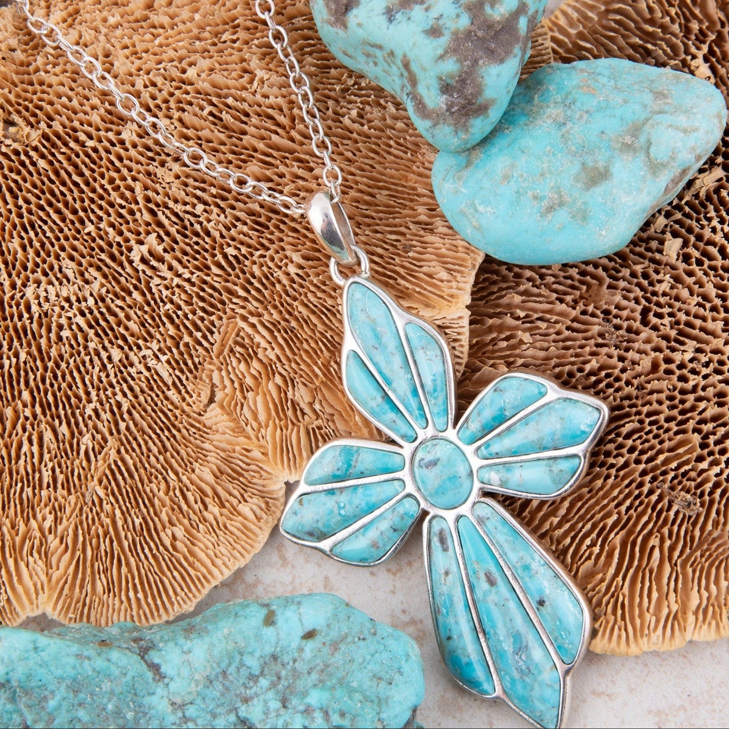 Turquoise flower pendant necklace on coral and turquoise stones