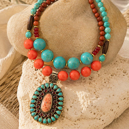 Adobe Blue Turquoise and Orange Coral Golden Pendant Statement Necklace
