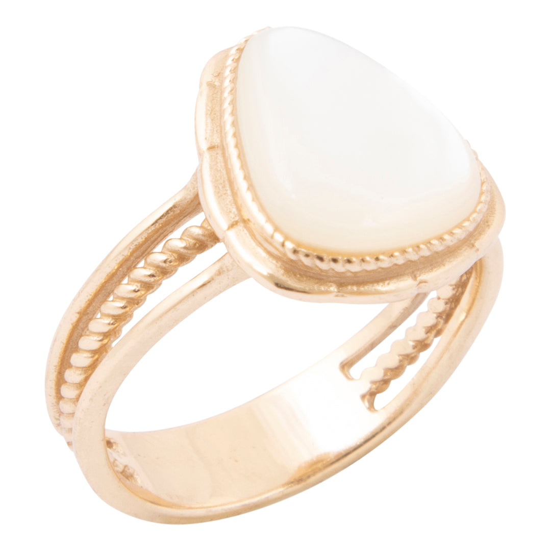 Gold ring with a white stone on a white background