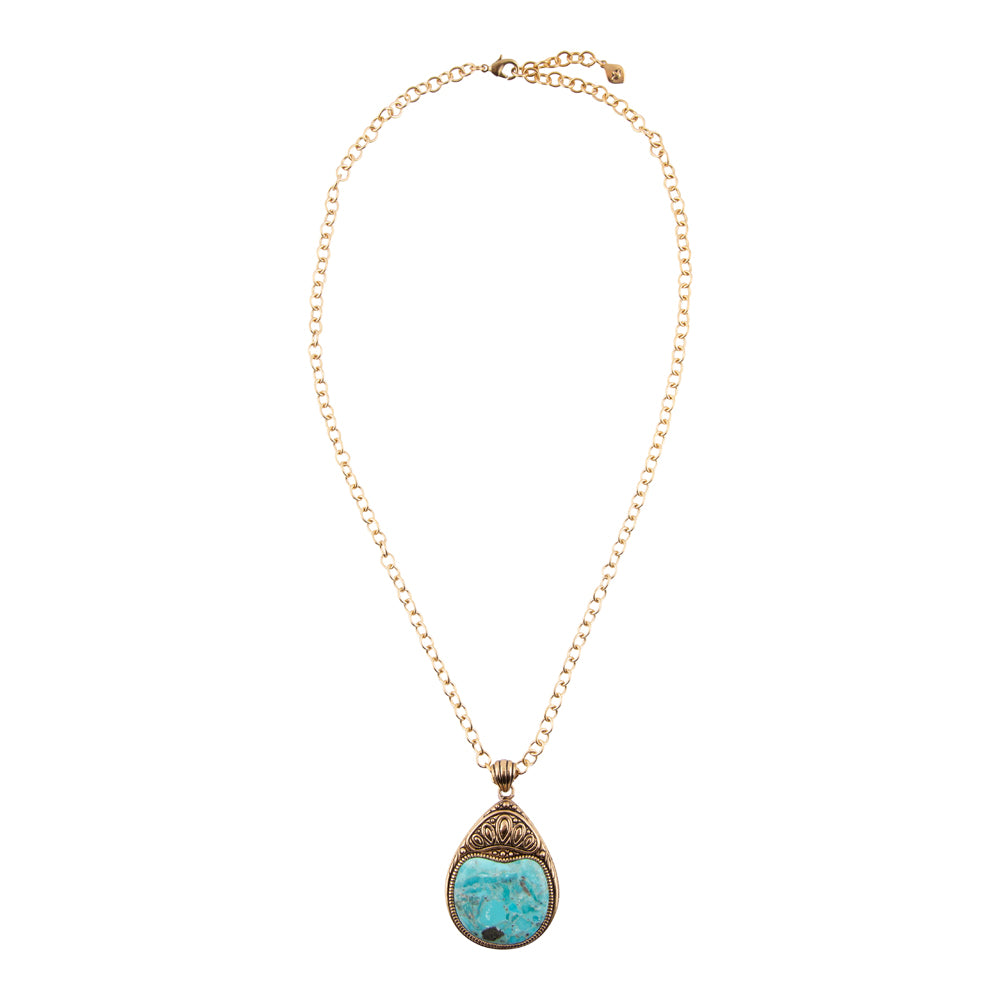 A gold chain necklace with a teardrop-shaped pendant featuring a light blue marbled stone in an ornate gold setting, shown against a plain white background.