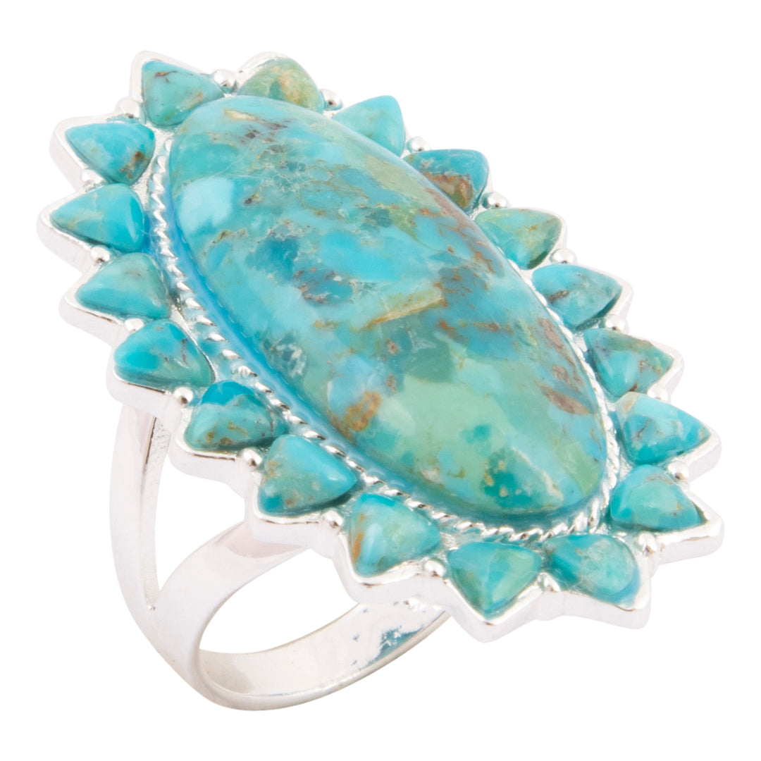 Turquoise ring with silver band on a white background