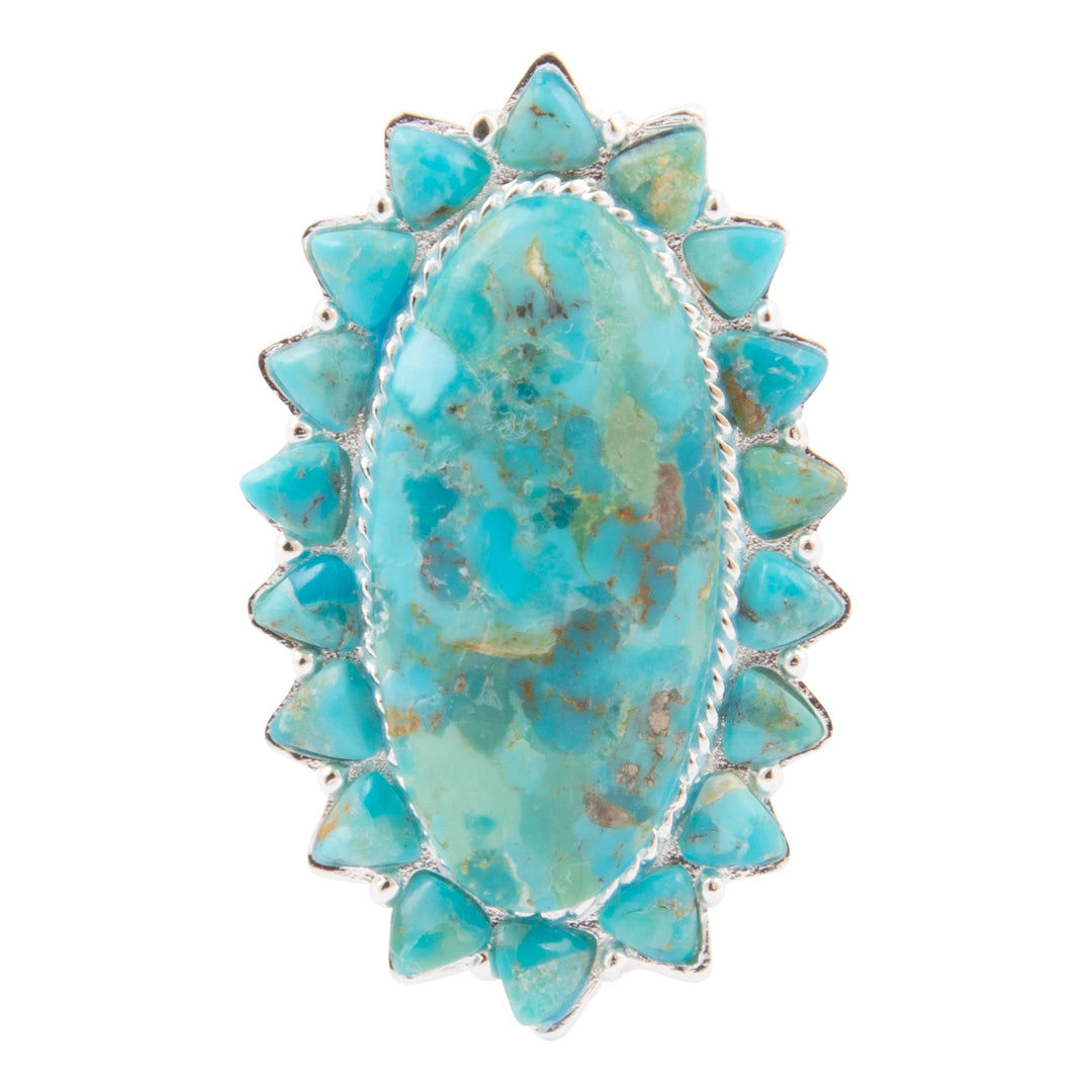 Turquoise ring with silver accents on a white background