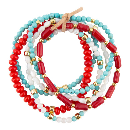 Set of colorful beaded bracelets on a white background