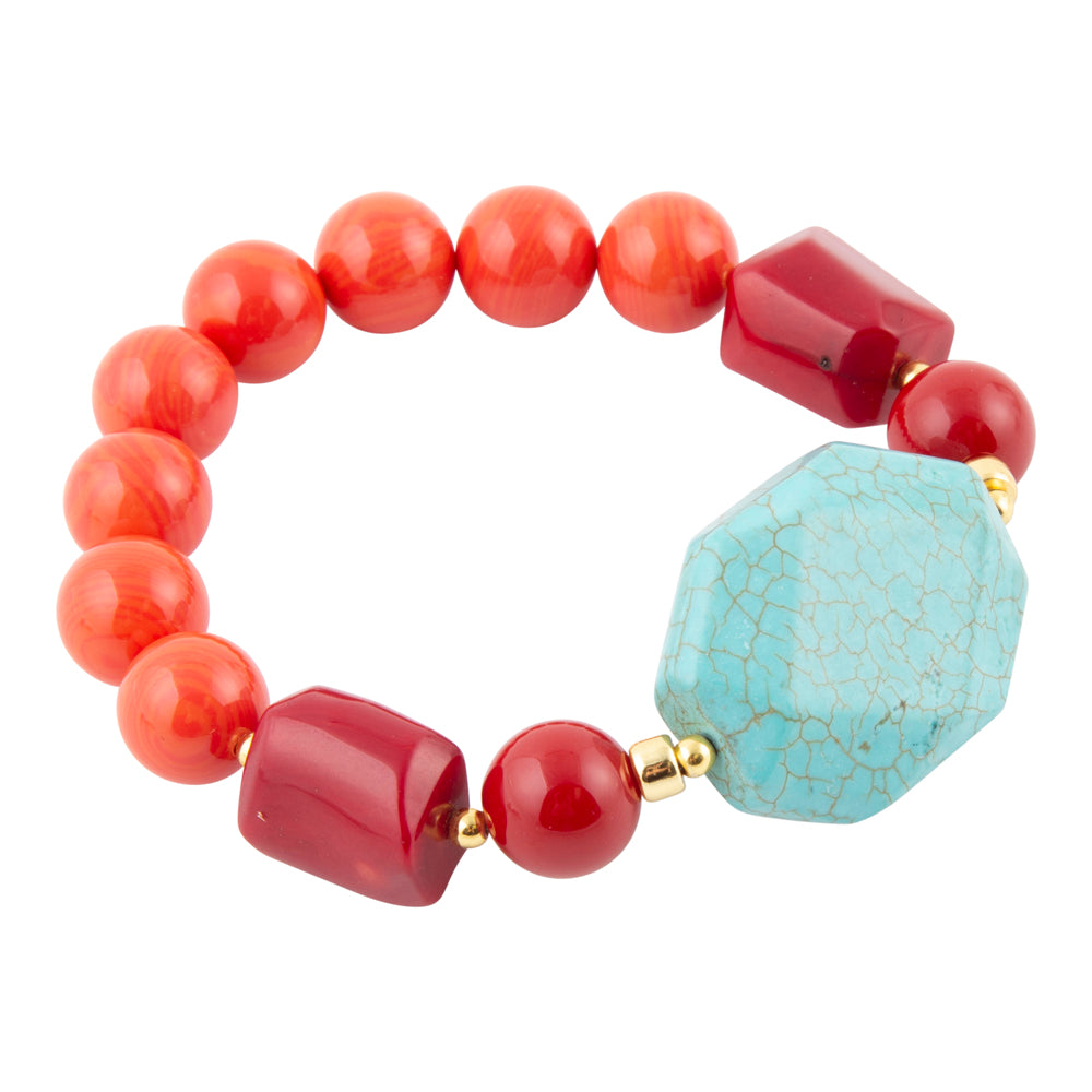 Bracelet with red and gold beads and a large turquoise bead on a white background