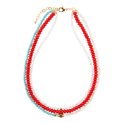Necklace with red, white, and blue beads on a white background