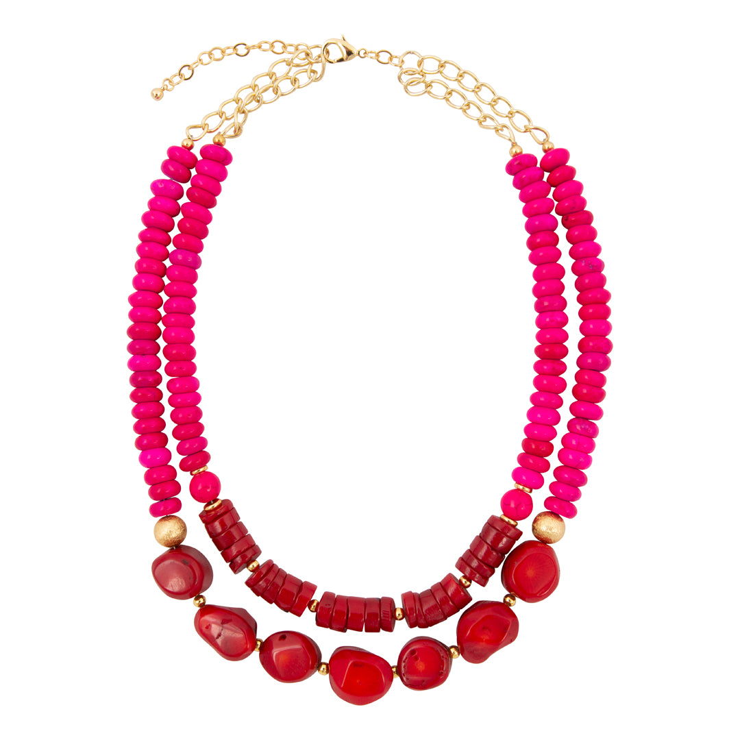 Necklace with pink and red beads on a white background
