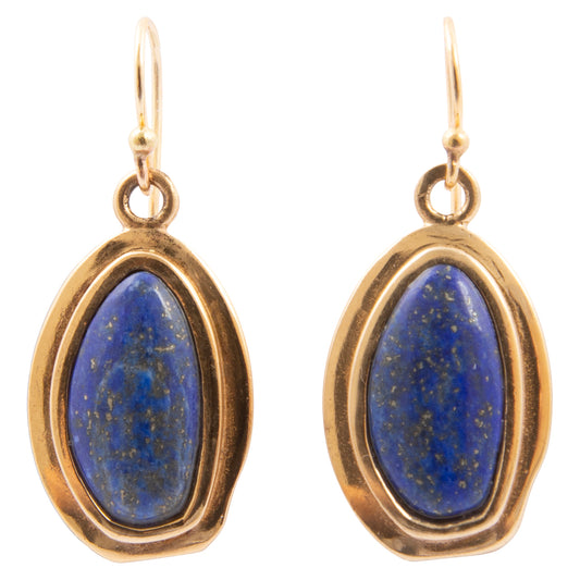Gold-framed blue stone earrings on a white background