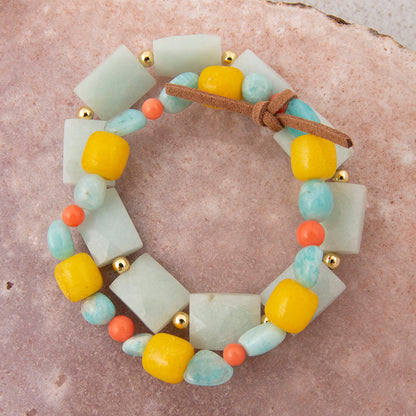 Multicolored beaded bracelet on a textured surface