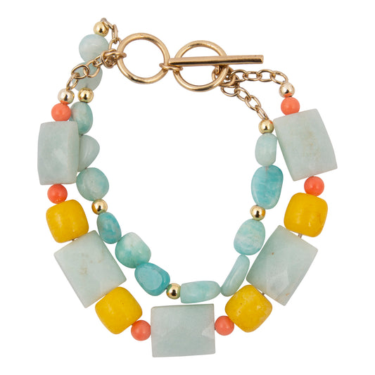 Multicolored beaded bracelet with a gold clasp on a white background