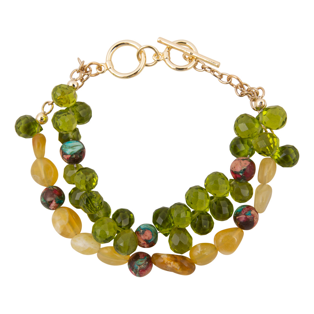 Multicolored beaded bracelet with a gold clasp on a white background