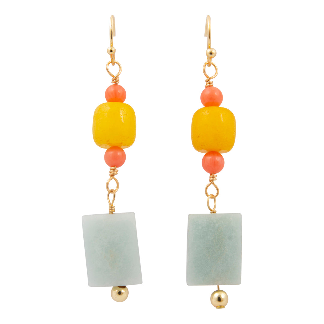 Pair of earrings with yellow, pink, and green beads on a white background