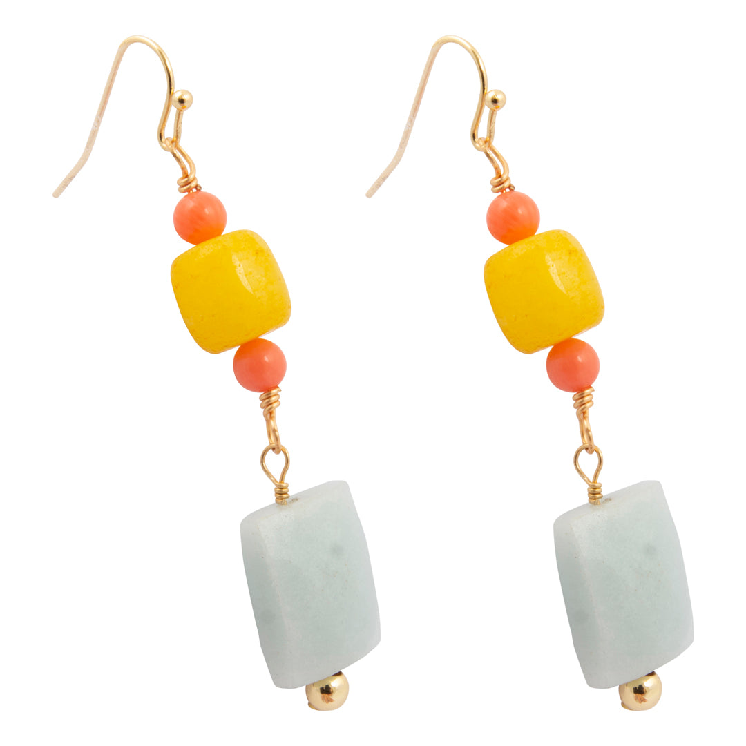 Pair of earrings with yellow, pink, and white beads on a white background