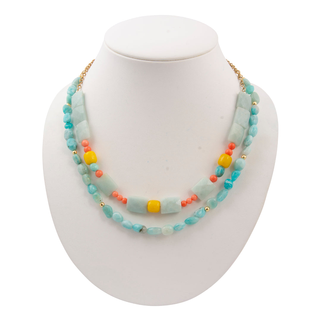 Necklace with multicolored beads on a white mannequin