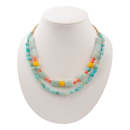 Necklace with multicolored beads on a white mannequin