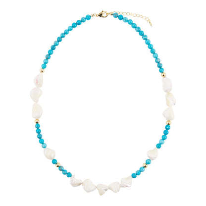 A beaded necklace featuring light blue faceted beads, irregular white shell-like accents, and small gold spacer beads, with a gold clasp and extender chain, shown on a plain white background.
