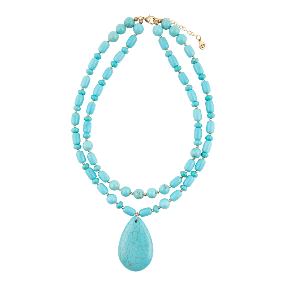 A double-strand turquoise beaded necklace with a large teardrop-shaped turquoise pendant, displayed on a clean white background.