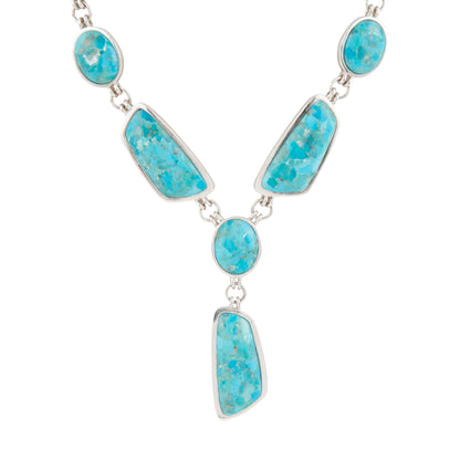 Necklace with turquoise stones on a white background