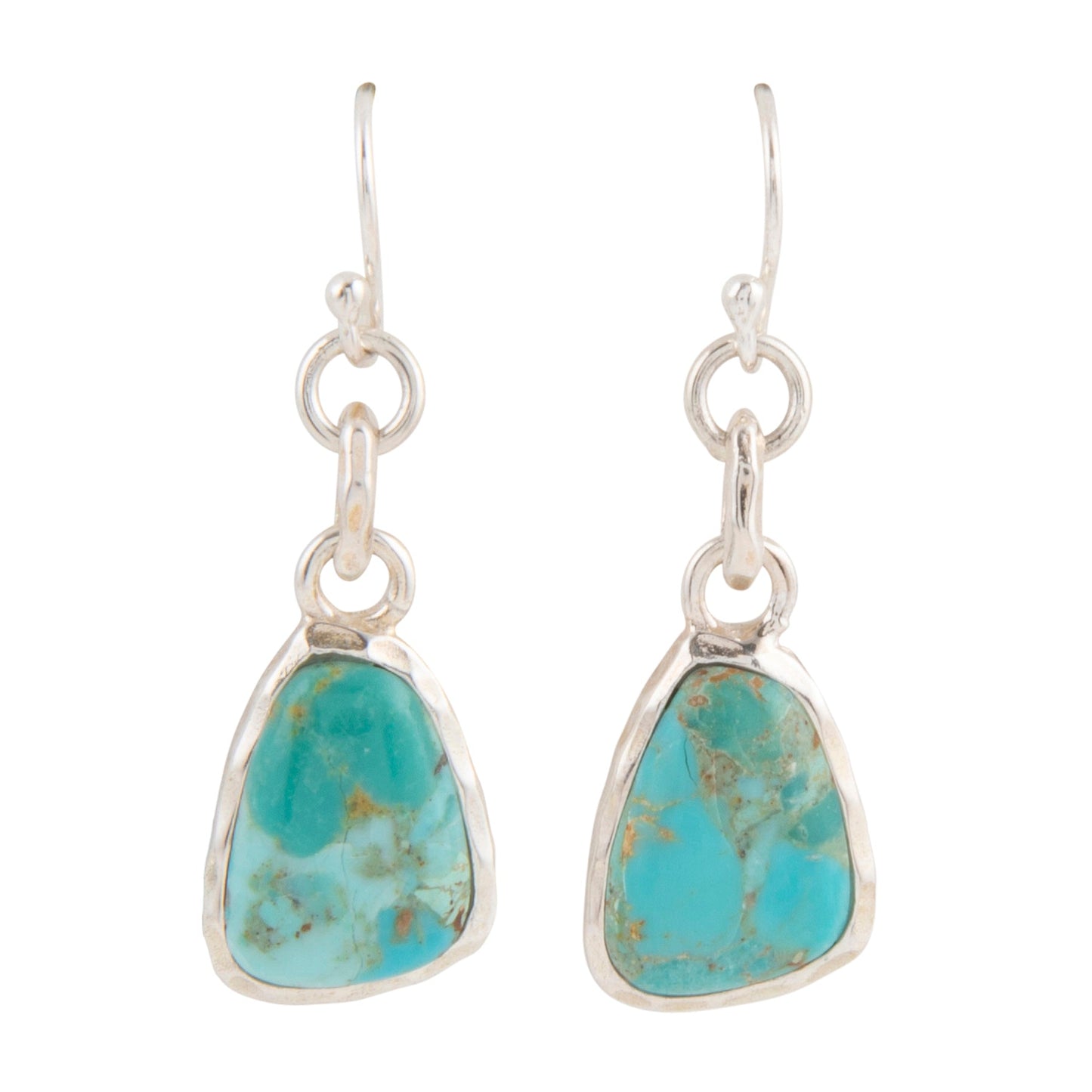 Turquoise teardrop earrings with silver settings on a white background