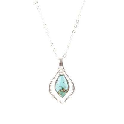 Turquoise pendant necklace on a white background