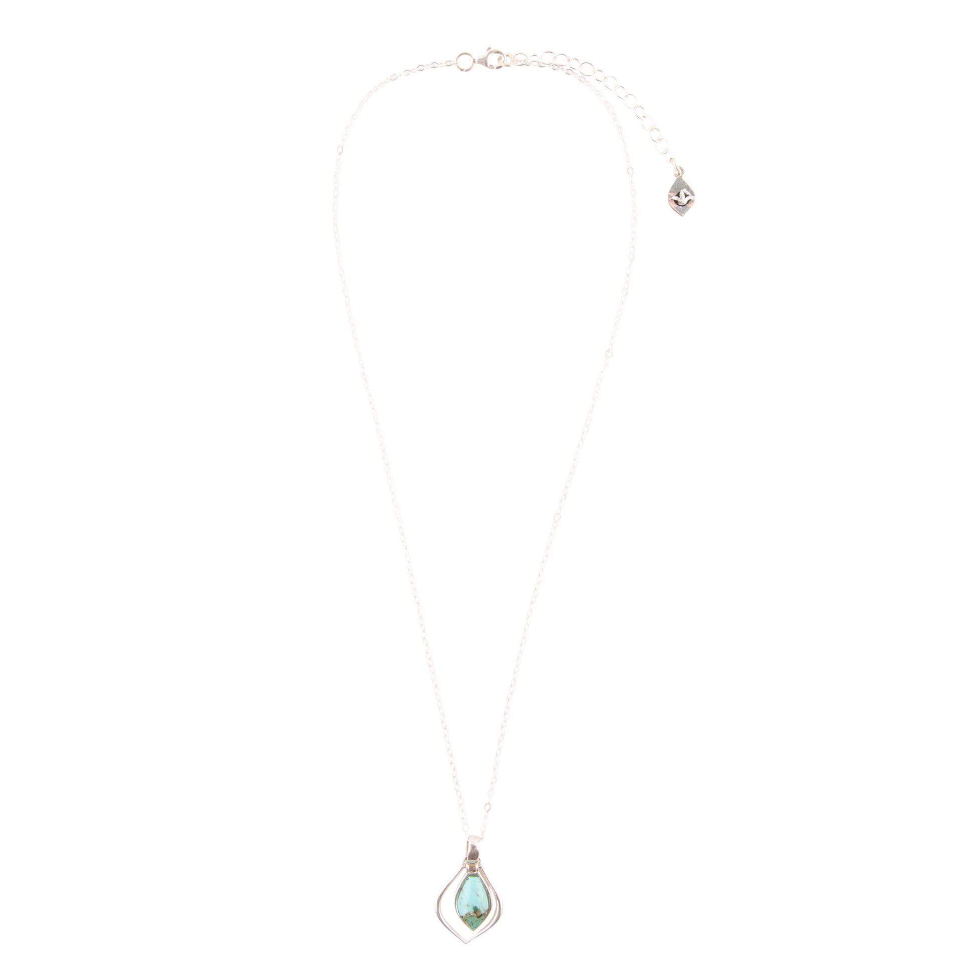 Delicate necklace with a teardrop-shaped pendant on a white background