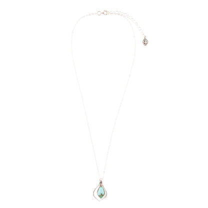 Delicate necklace with a teardrop-shaped pendant on a white background