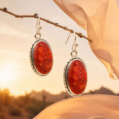 Red Mesa Coral Silver Drop Earrings: lifestyle background