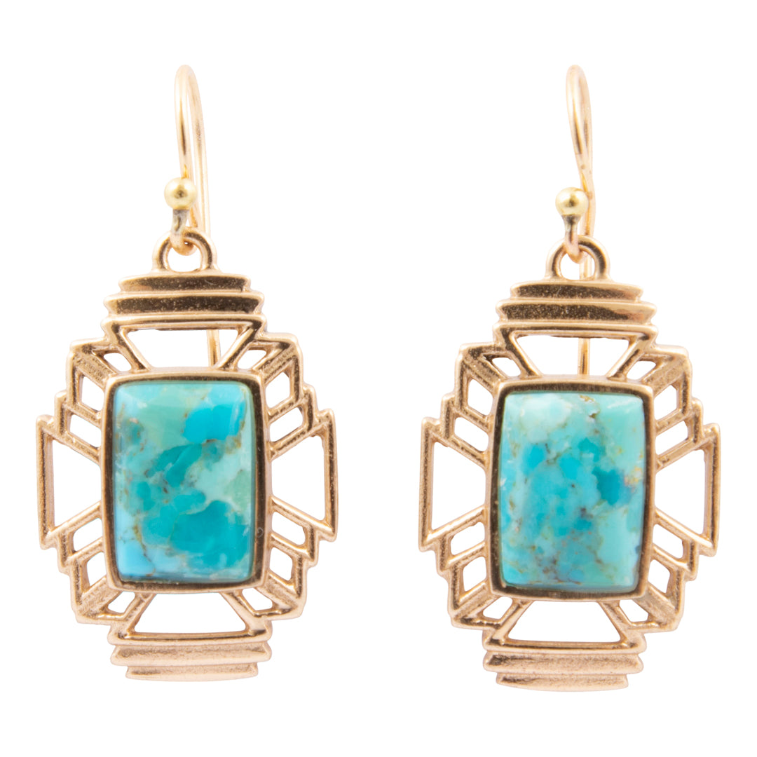 Gold earrings with turquoise stones on a white background