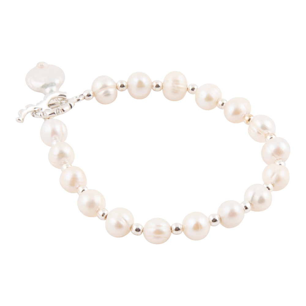 A pearl beaded bracelet with silver spacer beads and a silver clasp, shown on a plain white background.
