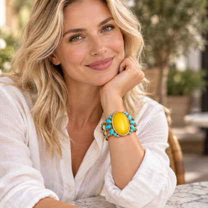 Model wearing Barse MOJAB03OPTB sunny yellow quartz and blue turquoise cuff bracelet.
