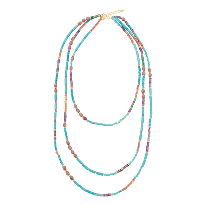 Multicolored beaded necklace on a white background