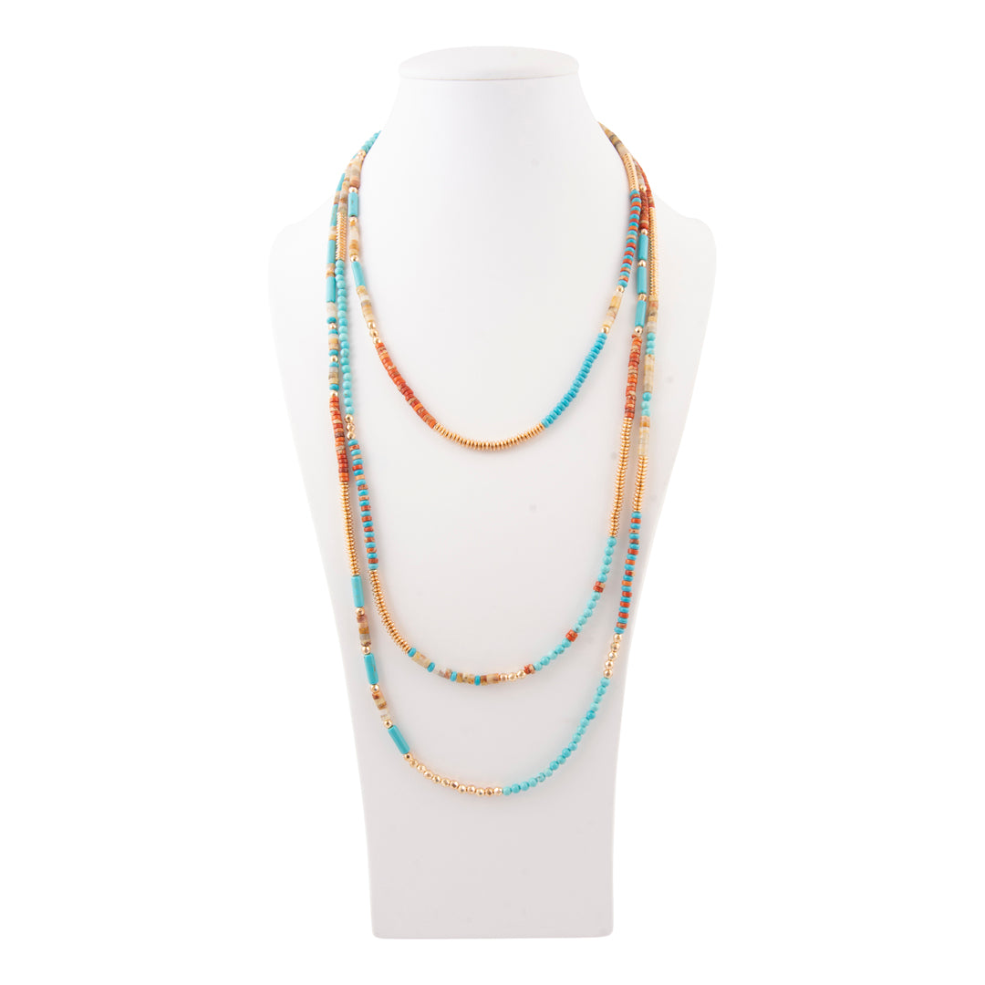 Multistrand beaded necklace on a white mannequin bust