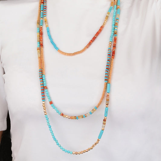 Colorful beaded necklace on a white background