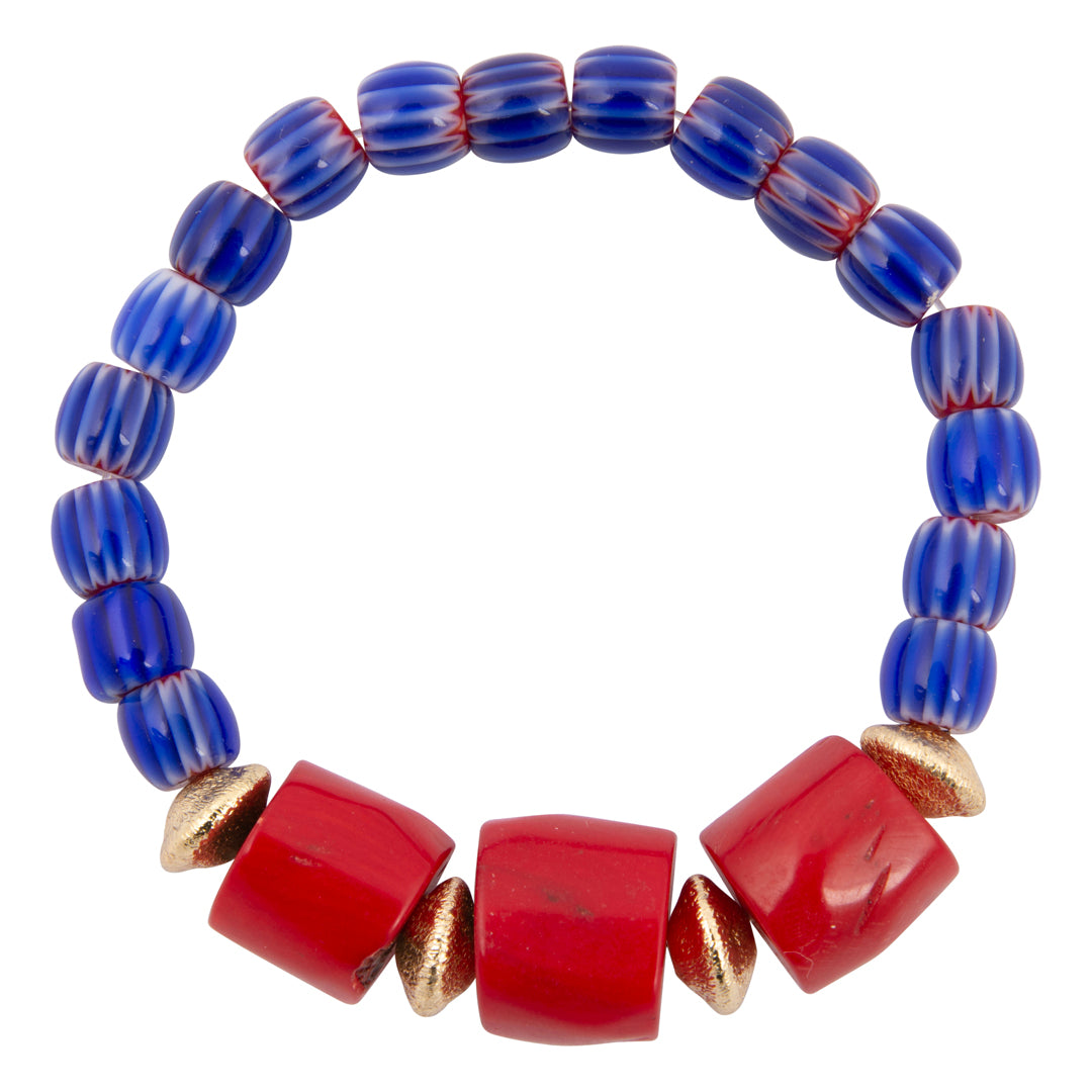 Bracelet with blue and red beads on a white background
