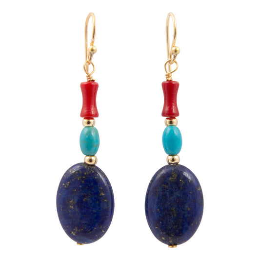 Pair of earrings with blue beads and red accents on a white background