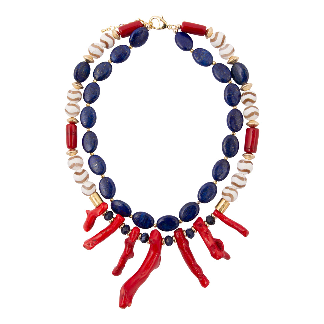 Necklace with blue, red, and white beads on a white background