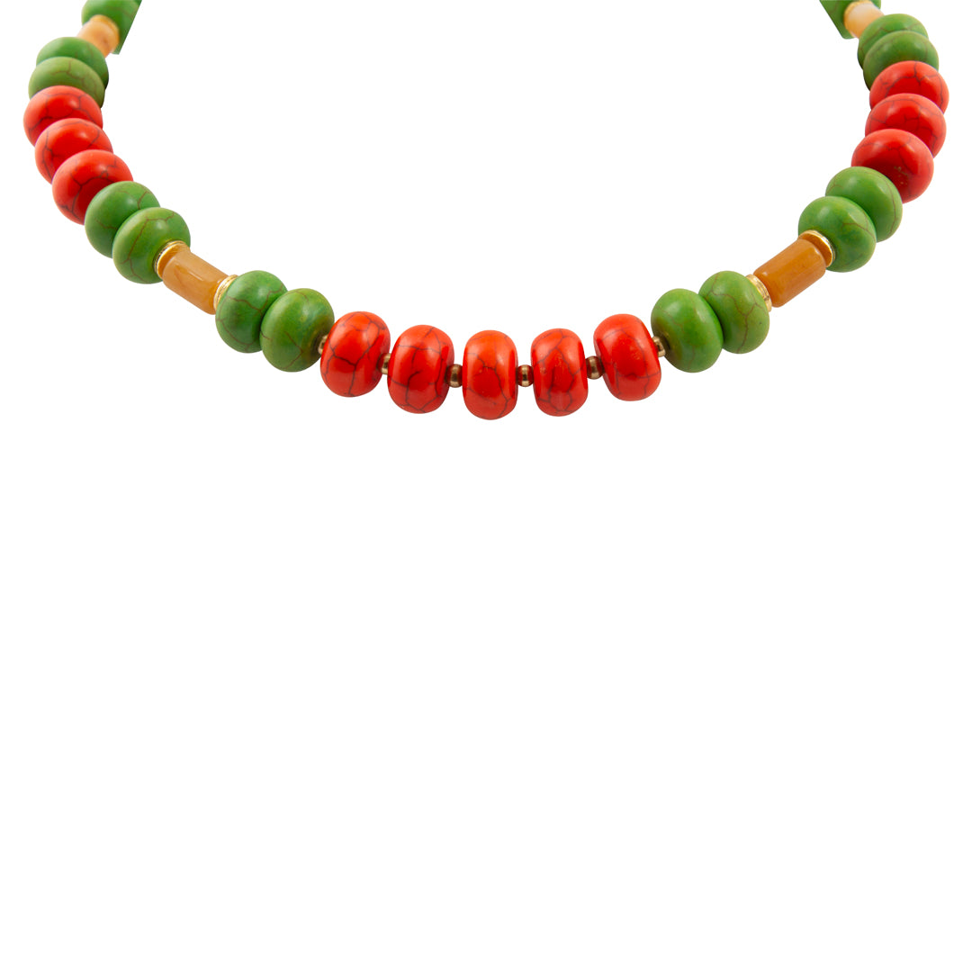 Necklace with green, red, and brown beads on a white background