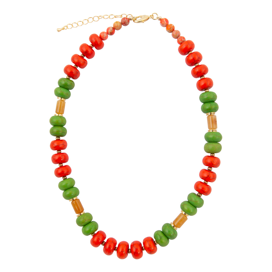 Necklace with green, red, and brown beads on a white background
