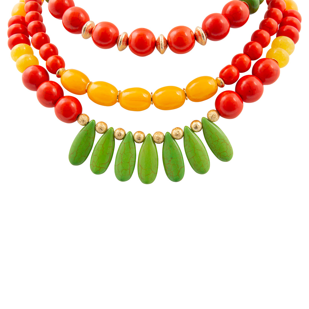 Three colorful beaded necklaces on a white background