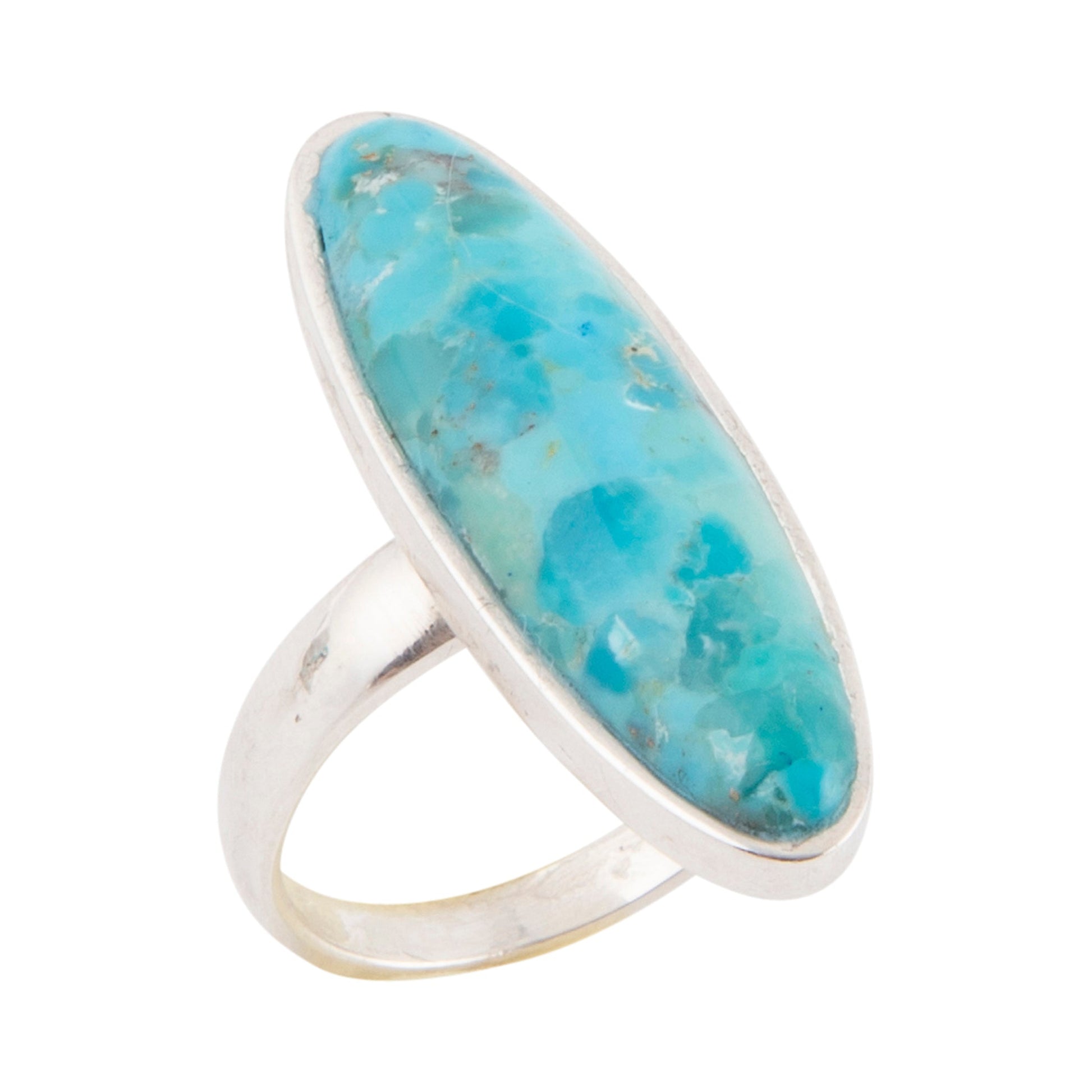 Turquoise ring with silver band on a white background