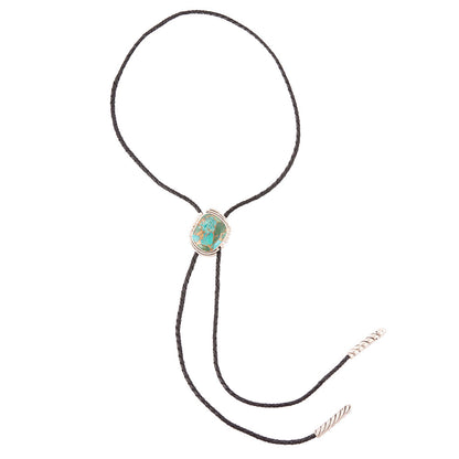 Bolo tie with turquoise stone on a white background
