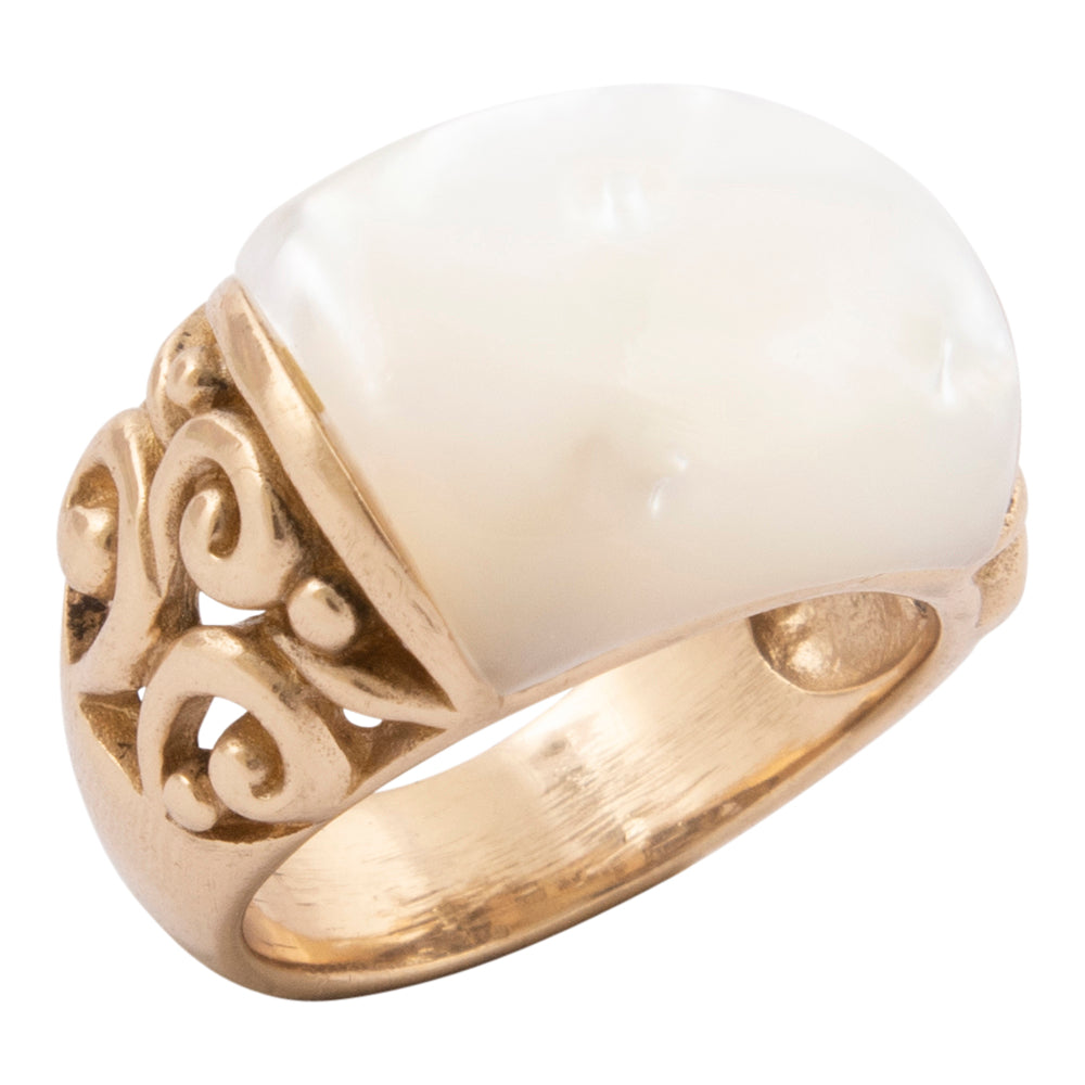 Gold ring with a large white stone on a white background