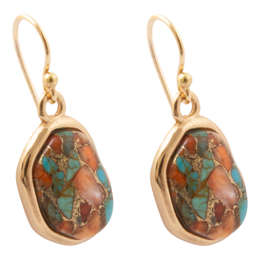 A pair of gold drop earrings featuring irregular turquoise and orange marbled stone inlays, set in polished gold bezels with fishhook wires, shown on a plain white background.
