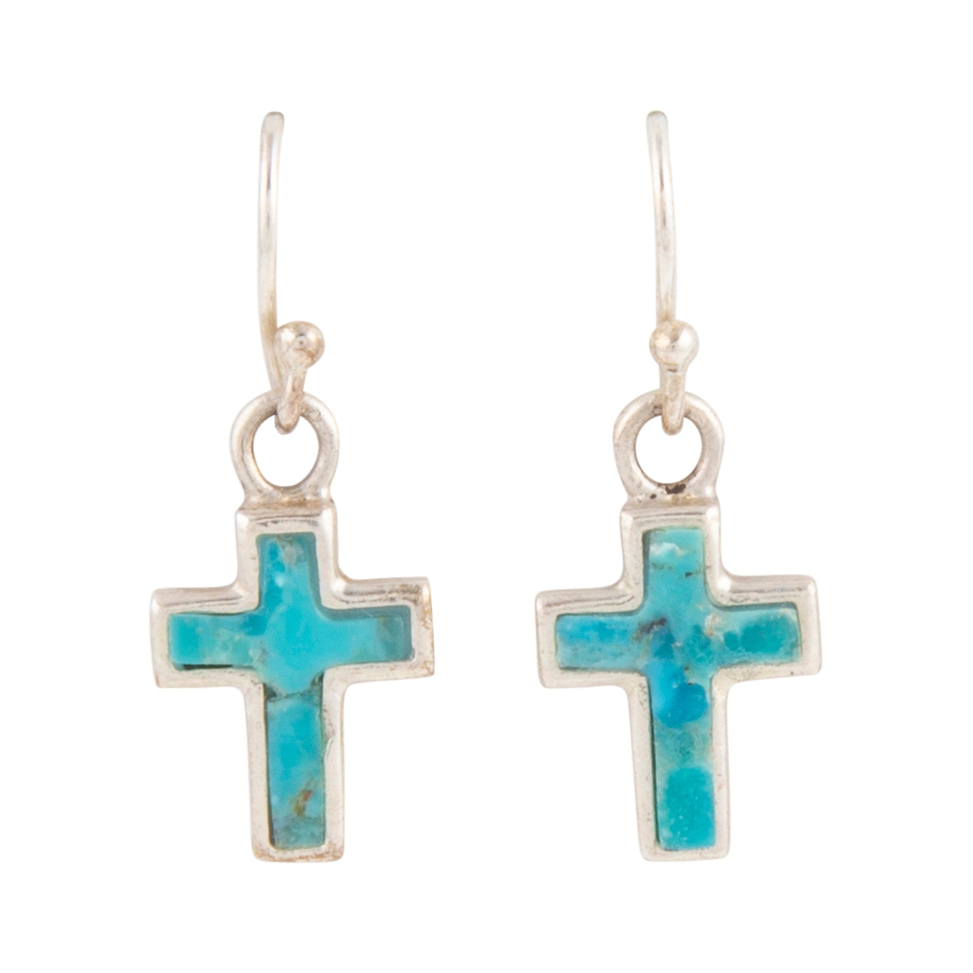 Cross-shaped earrings with turquoise stone inlay on a white background