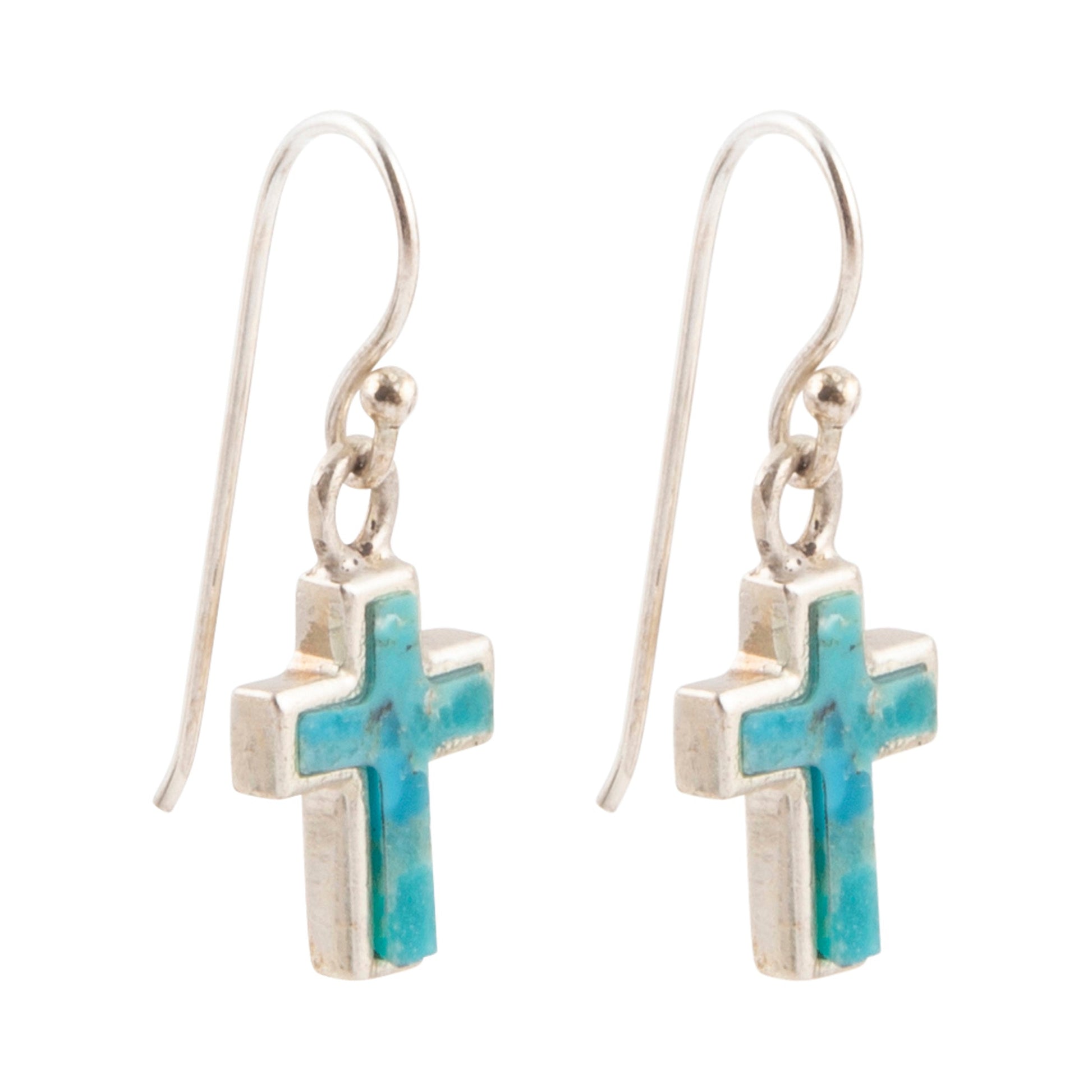 Silver cross earrings with turquoise accents on a white background