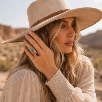 Woman wearing a wide-brimmed hat in a desert setting